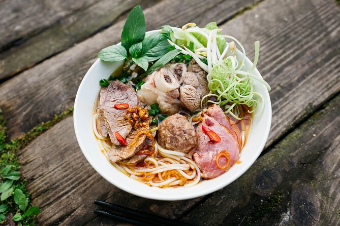 12 Tasting Street Food & Sightseeing By Scooter with Student - The ride to Thich Quang Duc’s memorial: history without the museum mood