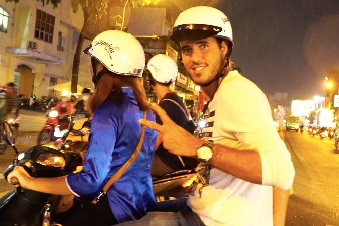Award-winning Saigon Food Tour with GirlPower Drivers | KissTour - Scooter logistics: helmets, rain ponchos, and where you sit