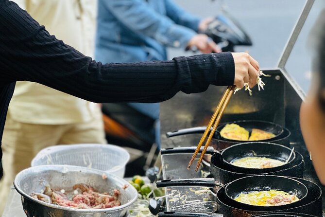 Committed Non-Touristy Saigon Street Food Tour By Scooters/Car - Nguyen Thien Thuật Apartment Buildings: A Nostalgic Saigon Stop