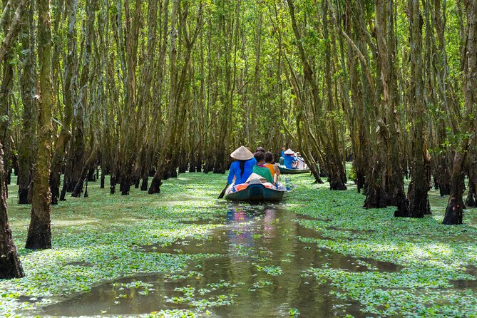 Cu Chi Tunnels and Mekong Delta 1 Day Tour from Ho Chi Minh City - Sampan canal ride and coconut treats: the gentle half of the day