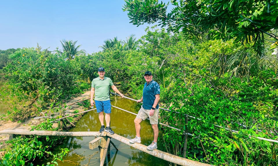 From HCM: Cost-Saving CuChi Tunnel & Mekong Delta 1-Day Tour - Boat Ride on the Mekong: My Tho to Ben Tre and Sampan Rowing