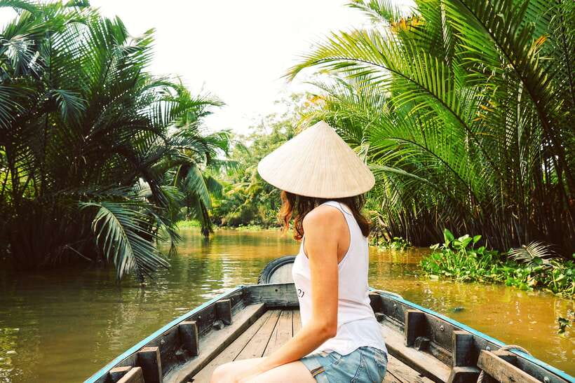 From Ho Chi Minh: Mekong Delta Small Group Day Trip - Rowing sampan through narrow canals: the close-up that people remember