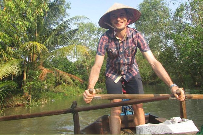 Full-day Cai Rang floating market - explore countryside, make bakery - from HCM - Canals, Sông Cần Thơ, and the Binh Thuy Ancient House: a day that changes scenery