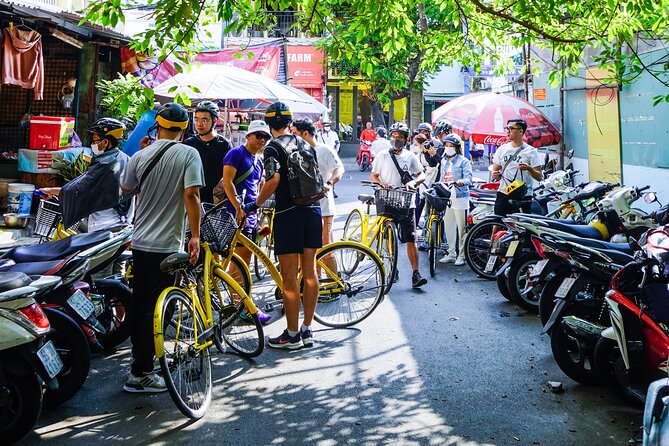 Half Day - Saigon Off-the-Beaten-Path - City Cycling Tour - District 10: Umbrella Market and the 1968 apartment complex