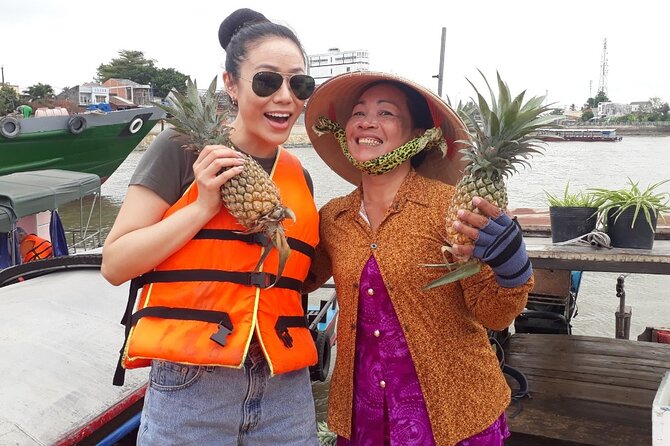 HCM: 2-Day Mekong Delta Floating Market with Cooking & Bike Ride - Leaving Ho Chi Minh City: The Vinh Trang Pagoda Start