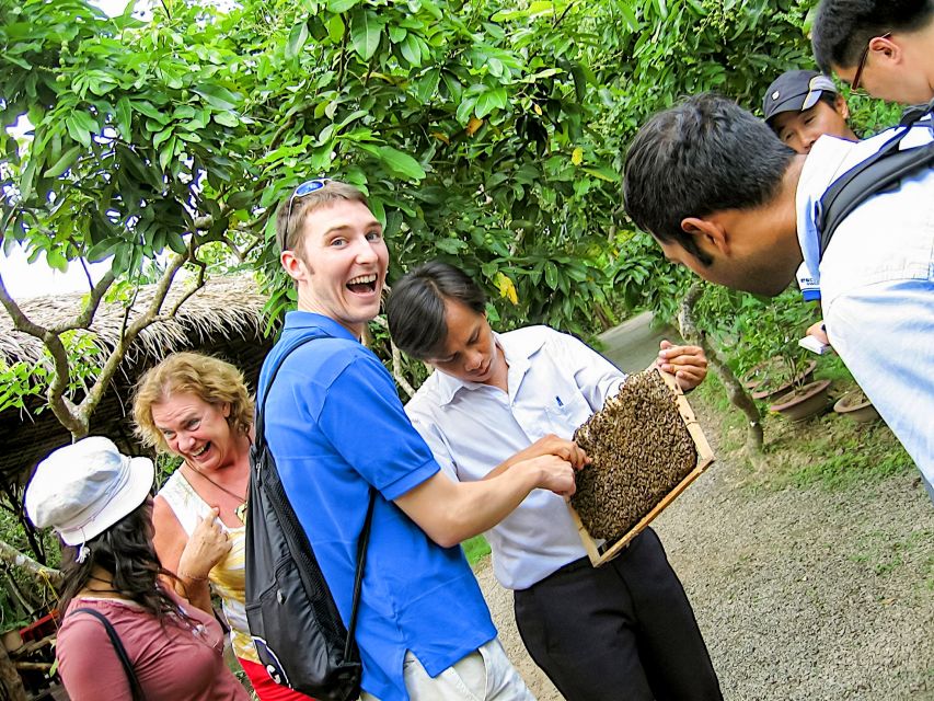 HCM: Cu Chi Tunnels & Mekong Delta with Coconut Village Tour - Sampan Ride Through Coconut Canals and Folk Music