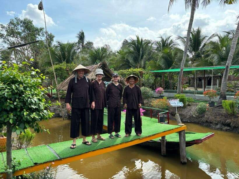 Ho Chi Minh City: 2-Day Bike & Kayak Mekong Delta Tour - Day 1 at Family Tiny Garden: bikes, orchards, and a real cooking class