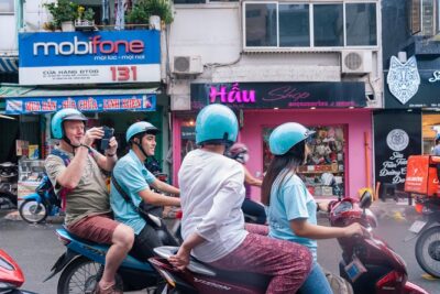 Ho Chi Minh City Motorbike Tour with Student | Saigon Adventure - Safety first: helmet, insured rides, and drivers who know the rules of chaos