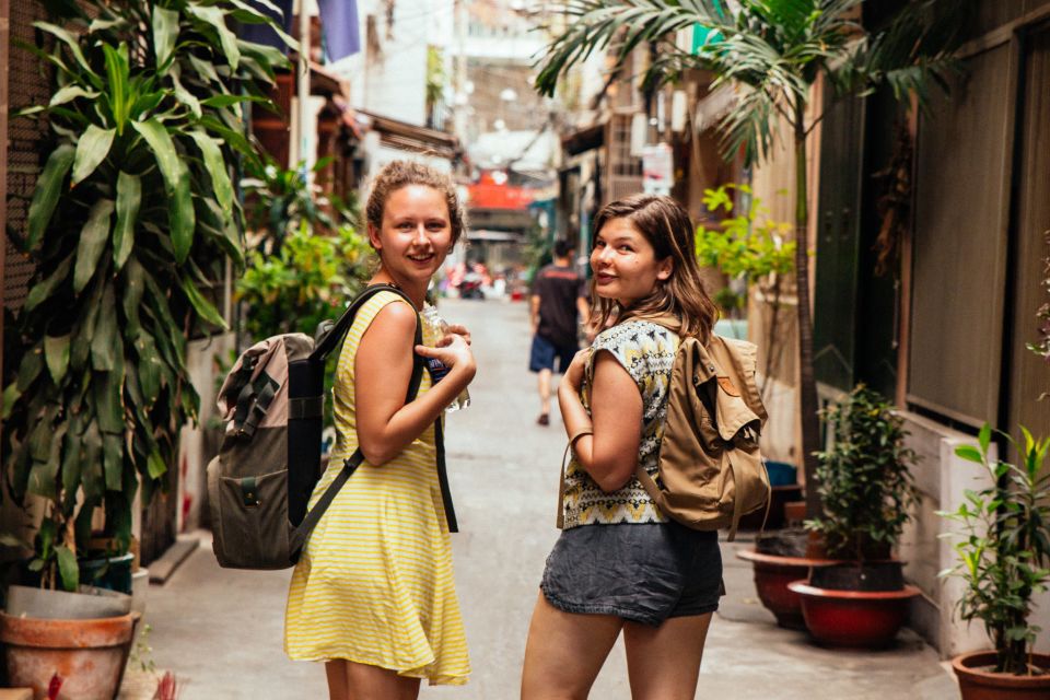 Ho Chi Minh City: Private City Tour Off the Beaten Track - Binh Tay market and street-food style stops: fruit tasting and coffee