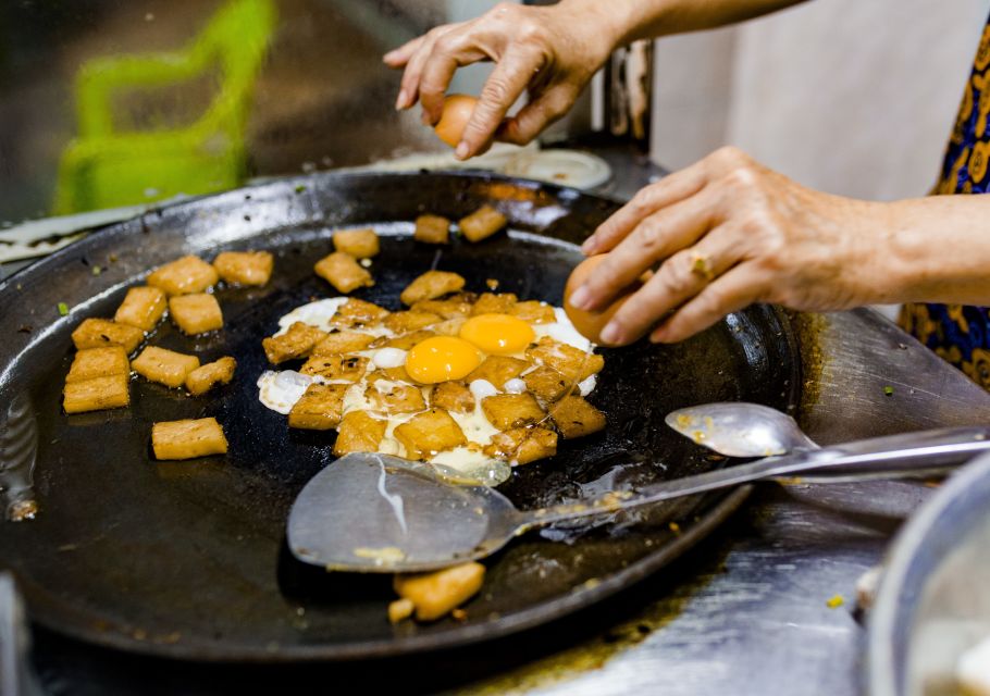 Ho Chi Minh City: Private Street Food Evening Walking Tour - Sugar cane juice with orange: sweet, cooling, and practical