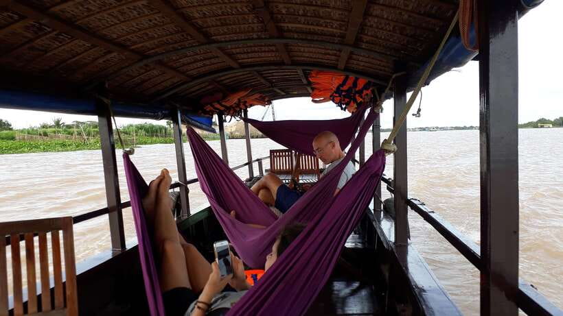 Mekong Day Tour by Car:Cai Be market, Local Island & Cycling - Private Boat Morning on the Mekong: Snacks, Crafts, and Music