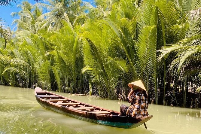 Mekong Delta Full Day Tour - Hand-rowed boats through narrow canals: where the day turns quieter