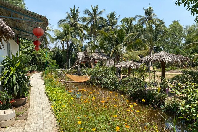 Mekong Delta Nature Cano-Kayak-Cycling & Fishing Private Day Trip - Family Tiny Garden: cycling, rice-field views, and Xom Trau Pagoda