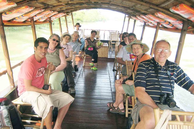 Mekong Delta Tour with Kayaking, Cycling and Cooking - Con Phung and Unicorn Island: Tien River calm, sampan rides, and music
