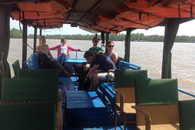Private Cu Chi Tunnels and Mekong Delta: Full-Day Guided Tour - Cu Chi Tunnels: start with the film, then the real thing