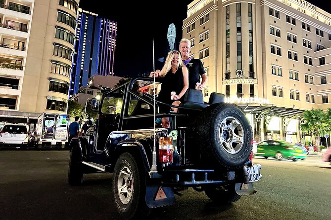 Private Jeep City Tour Saigon by Night and Skybar Drink - Entering Ho Chi Minh City’s night scene from a Jeep