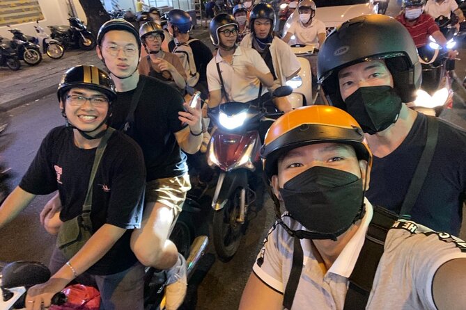 Private Saigon Ultimate Street Food & Motorbike Experience - District 1 pickup, Saigon Opera House meeting point, and how the night starts