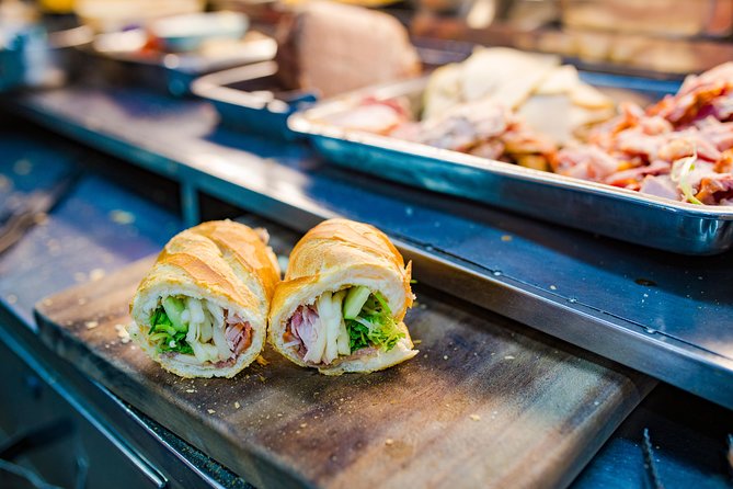 Private Street Food Evening Walking Tour in Ho Chi Minh City - From barbecue seafood streets to bo la lot and noodle soup