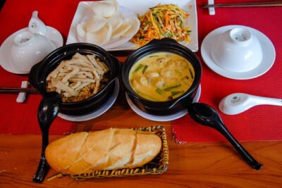 Private Vegan Food Tour By Scooter in Ho Chi Minh City - Getting on board at 5:30 PM: pickup, helmets, and the traffic reality
