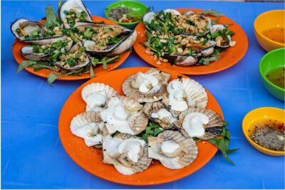 Saigon After Dark With Seafood, Beer & Live Music Bar - Nguyen Thien Thuat apartment buildings: the past stacked in concrete