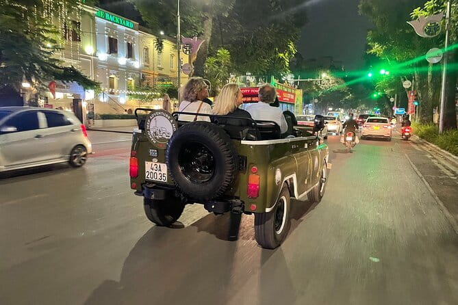 Saigon By Night Open Air Jeep Street Food Tour Experience - Where you start in District 1 and how the night loop feels