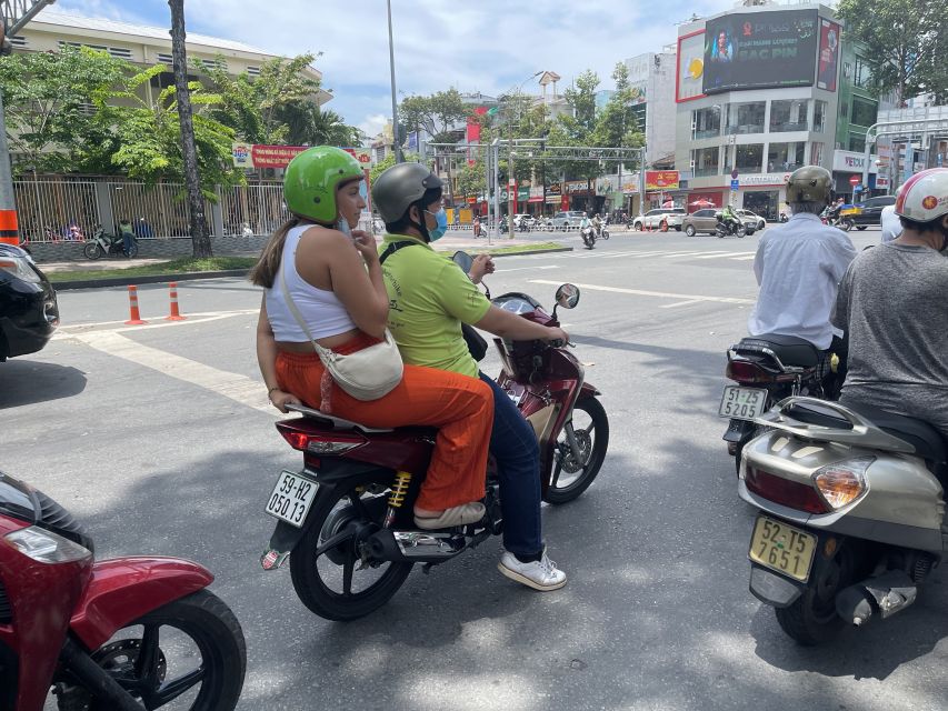 Saigon: City Highlights & Unseen Tour|Opt: Female Riders - Safety and gear on a motorbike in Ho Chi Minh City