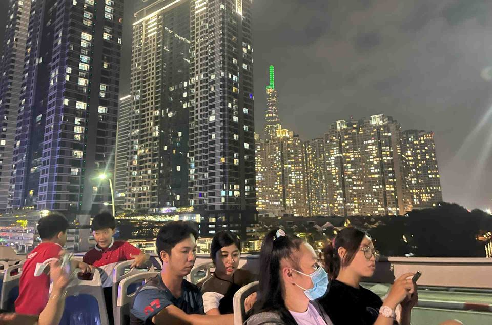 Saigon: City Sightseeing 45-Minute Panoramic Night Tour - Turtle Lake and Diamond Plaza: local night life meets city glow