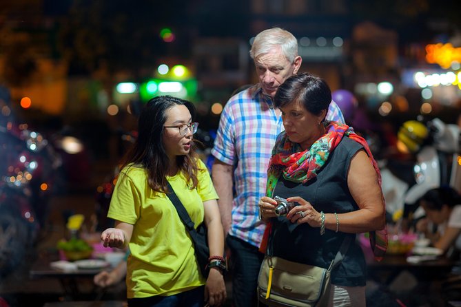 Saigon Night Street Food and City Tour on Scooter - Night in Saigon from the back of a scooter