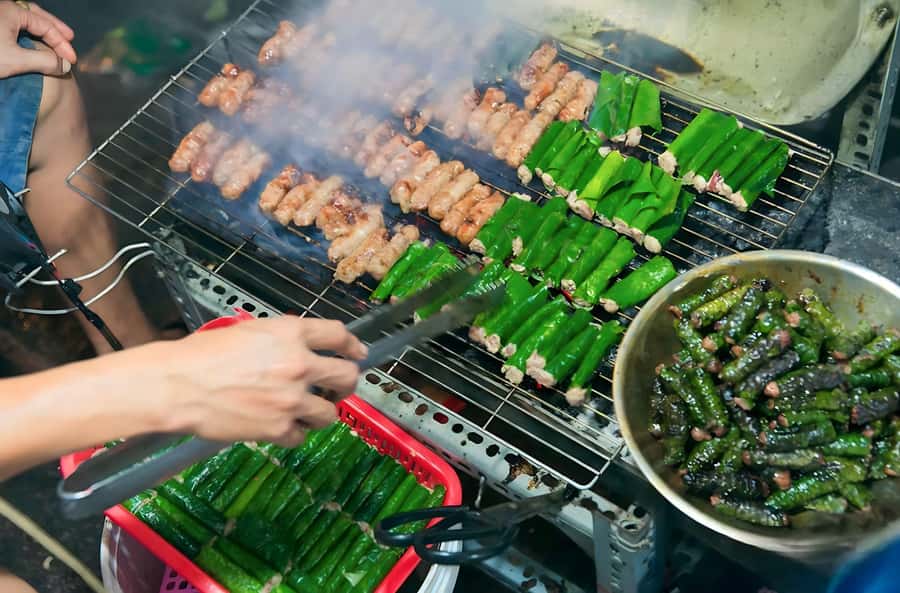 Saigon: Private Backstreets Walking Food Tour - Your First Bowl in District 1: Bún Bò Huế