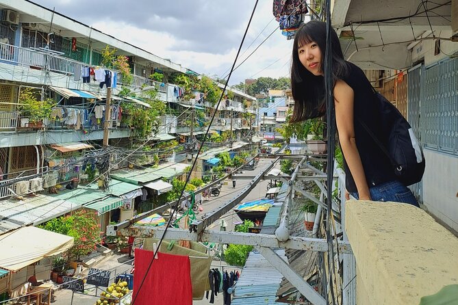 Saigon Private/Small Group Walking Food Tour with 13 Tastings - The Ho Thi Ky Flower Market run: Bánh tráng nướng, stuffed snails, and more