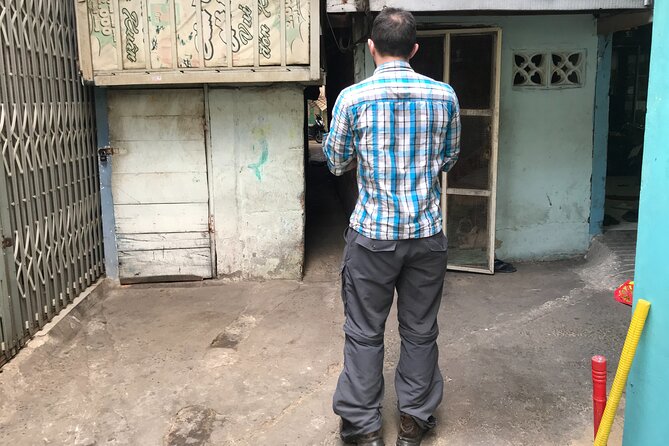 Saigon Slum tour and Saigon Chillspots by motorbike/ Aodai rider - Nguyen Thien Thuat Apartments: Why the 1968-Era Stop Matters