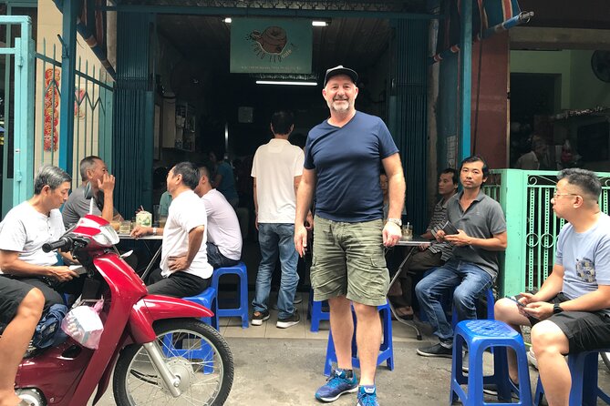 Saigon Slum tour and Saigon Chillspots by motorbike/ Aodai rider - Charity Food Stand Bites and Included Drinks: Real Taste, Not Just a Snack