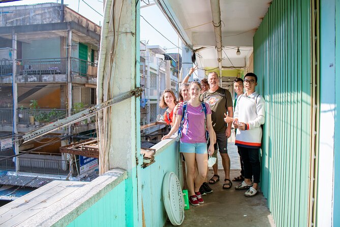 Saigon Unseen, History, & Hidden Gems Sightseeing Motorbike Tour - District 10 food and market time: wet market and tastings