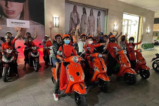 Saigon Vespa By Night Street Food With Female Riders Ao Dai - Street Food Stops That Read Like a Saigon Checklist