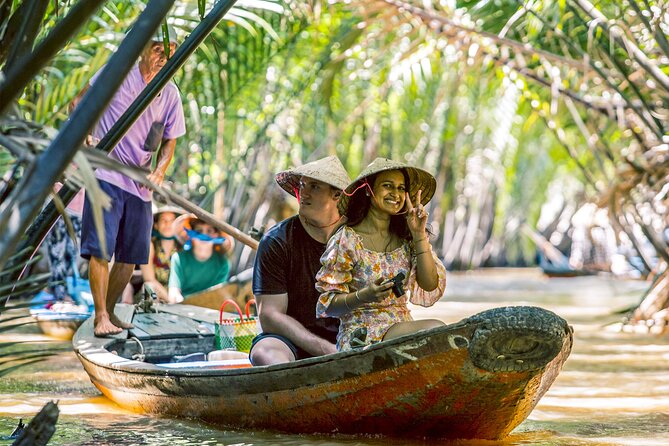 Small-Group Mekong Delta Day Trip: Boat Ride, Cottages & Pagoda - Motorboat cruise, canal switching, and the Rạch Miễu Bridge moment