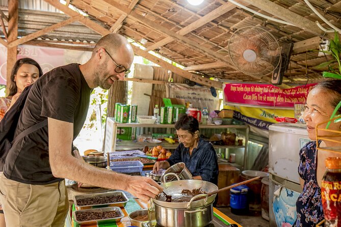 Small-Group Mekong Delta Day Trip: Boat Ride, Cottages & Pagoda - Ben Tre village workshop: coconut candy and honey products you can actually taste