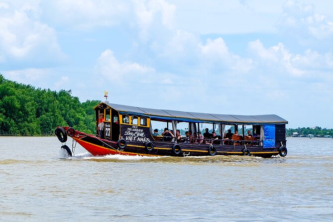 Small-Group Mekong Delta Day Trip: Boat Ride, Cottages & Pagoda - Boats, timing, and comfort: the real-life logistics to plan for