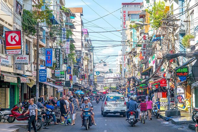 Small group Saigon Inside Out by Motorbike for 3 Hours - Buddhist monument and quick architecture stops (outside only)