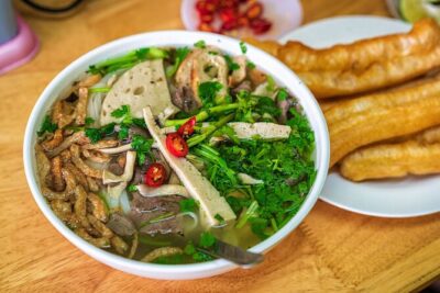 The Coolest Vegan Food Tour by Motorbike in Ho Chi Minh City - Motorbike logistics: the traffic is part of the experience