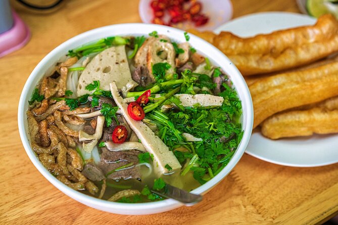 The Coolest Vegan Food Tour by Motorbike in Ho Chi Minh City - Motorbike logistics: the traffic is part of the experience